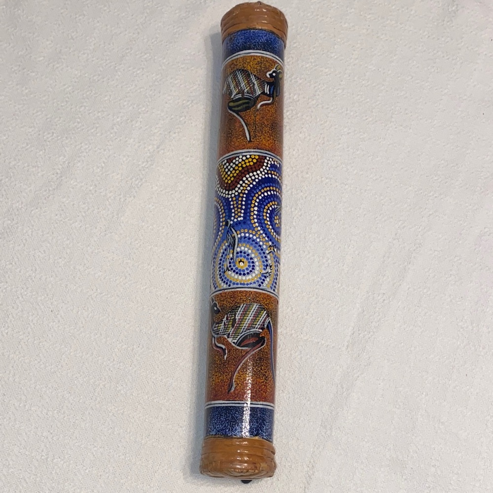 Hand carved rain maker